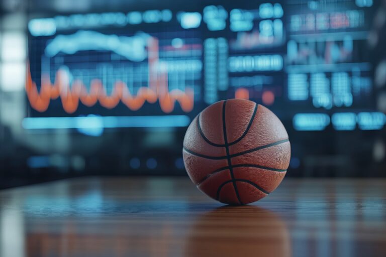 Basketball ball on the background of a display with analytics and statistics graphs